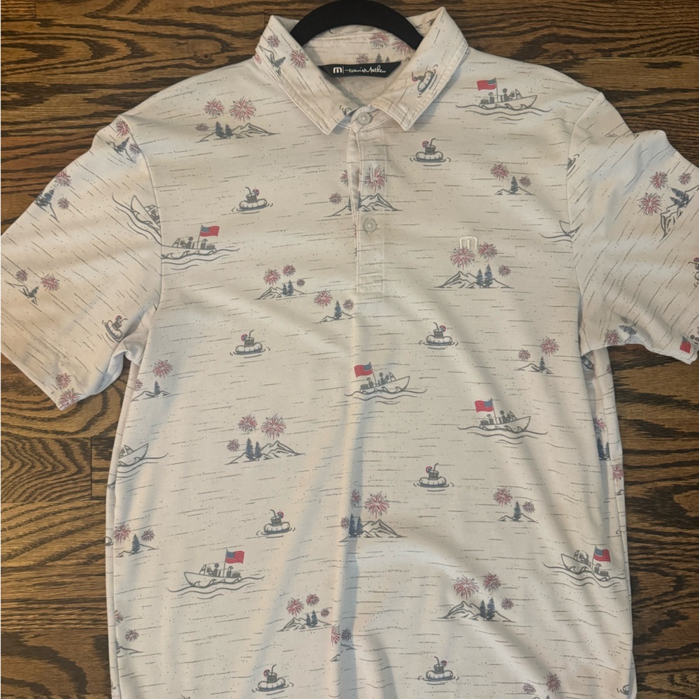 Travis Mathew polo size medium.